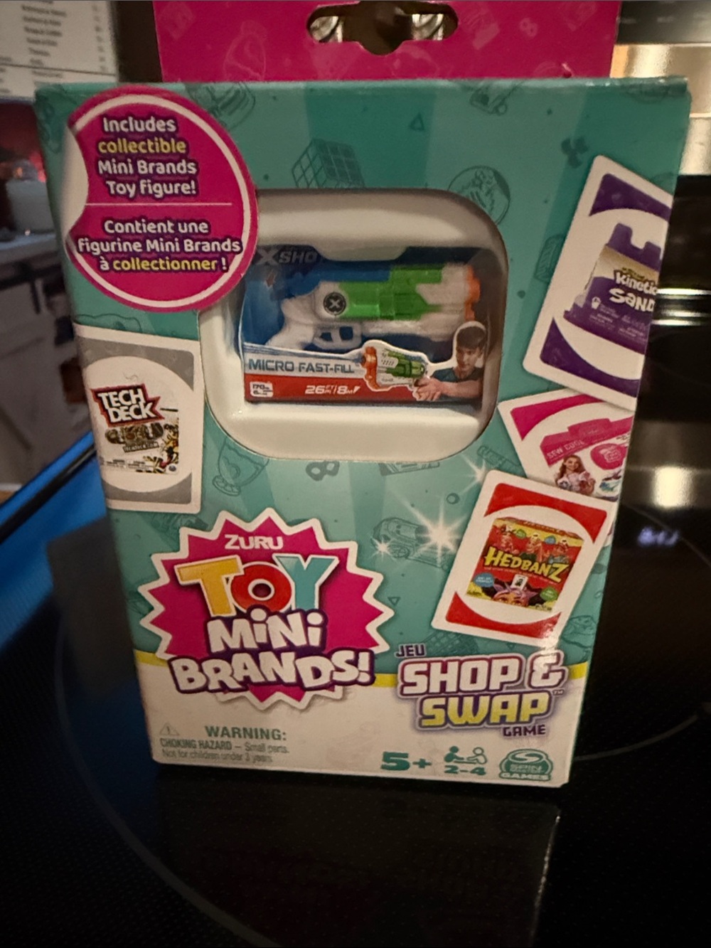 Toy Mini Brands Shop & Swap - Blue and Green Mini Toy Blaster (game)